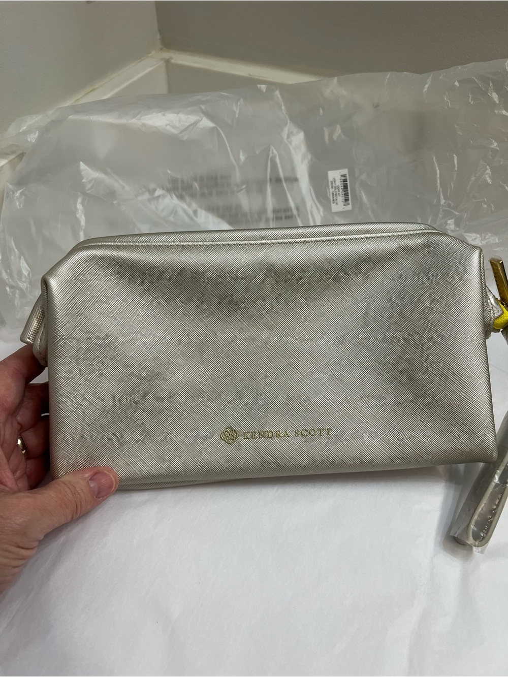 Kendra Scott Metallic Silver Cosmetic Case with Gold Logo